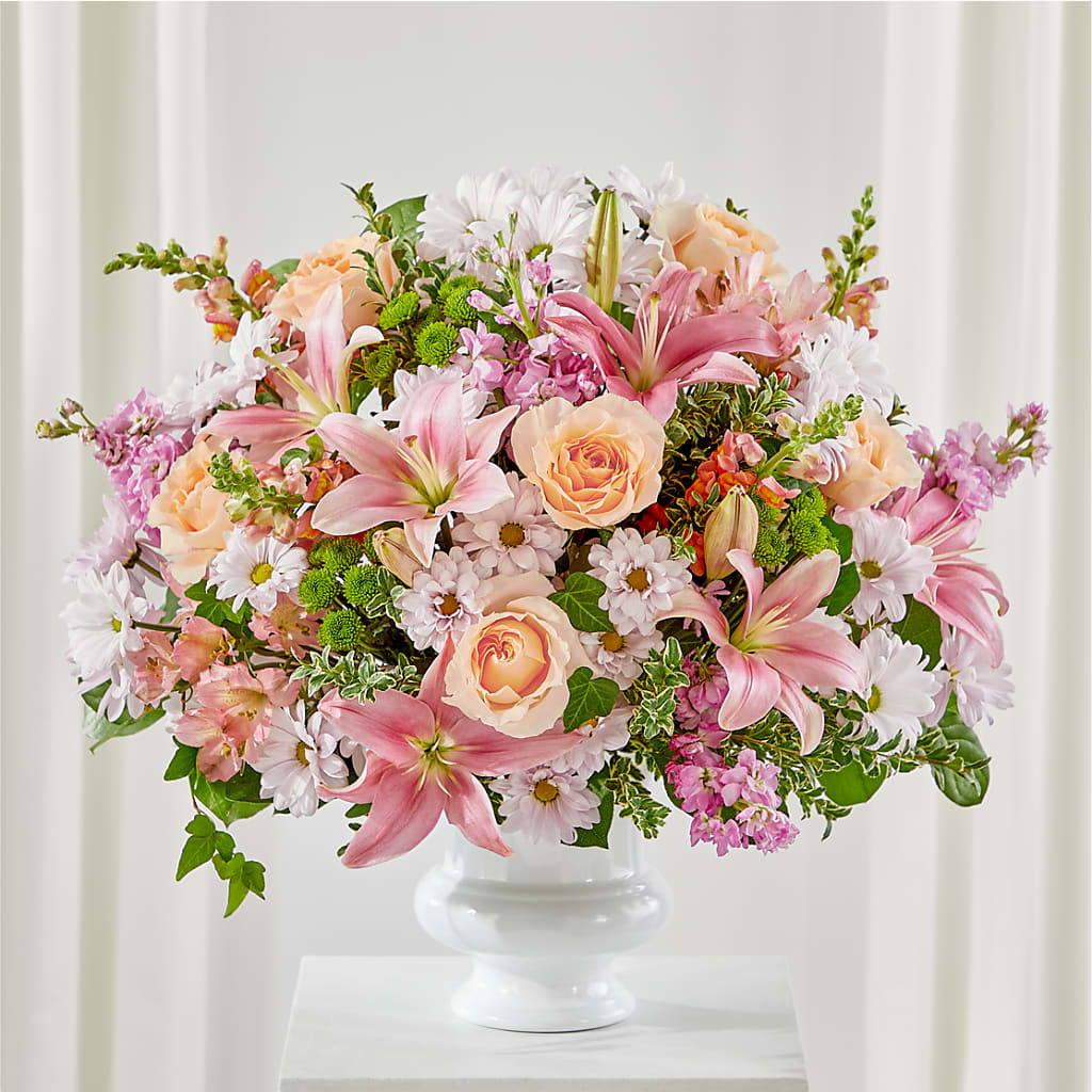 Arreglo floral para urna con un gesto sincero