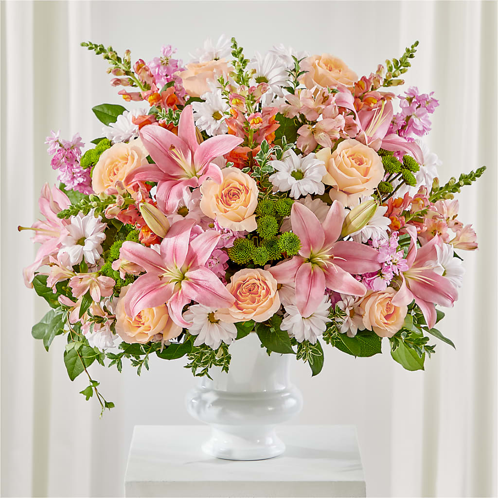 Arreglo floral para urna con un gesto sincero